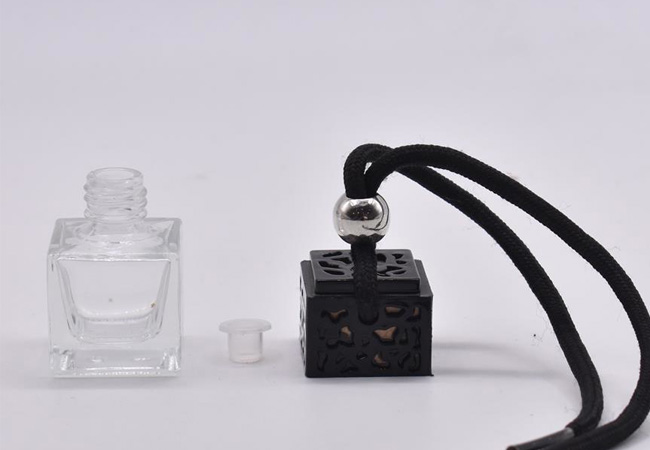 https://www.rowellpackage.com/wp-content/uploads/2023/03/empty-car-perfume-diffuser-bottle.jpg